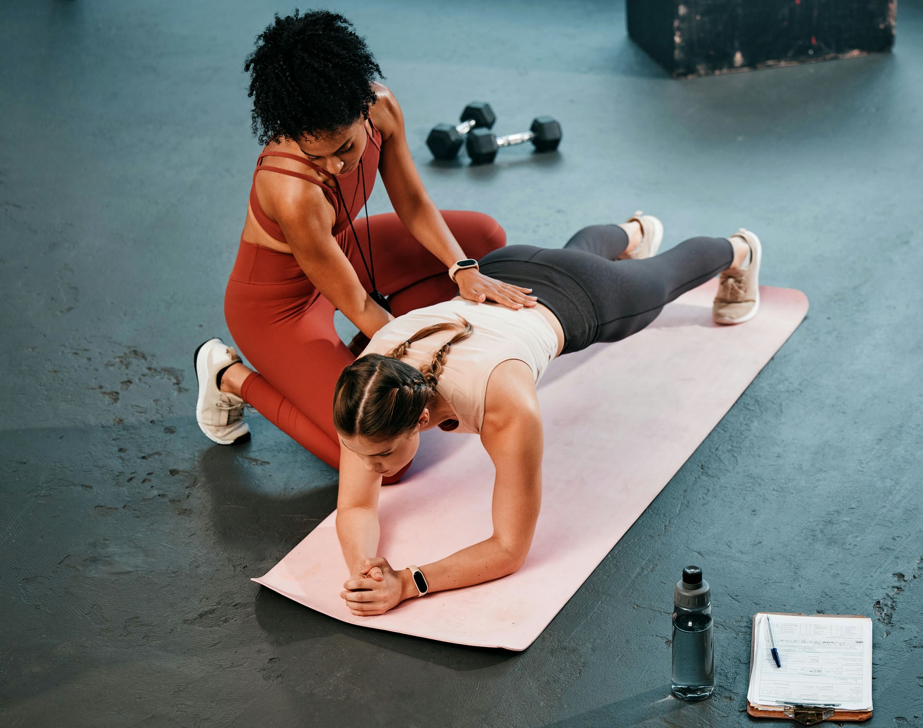 fitness-plank-or-personal-trainer-coaching-woman-2023-11-27-04-50-14-utc_min Fitness, plank or personal trainer coaching woman in training, exercise or workout at gym club. Wom.